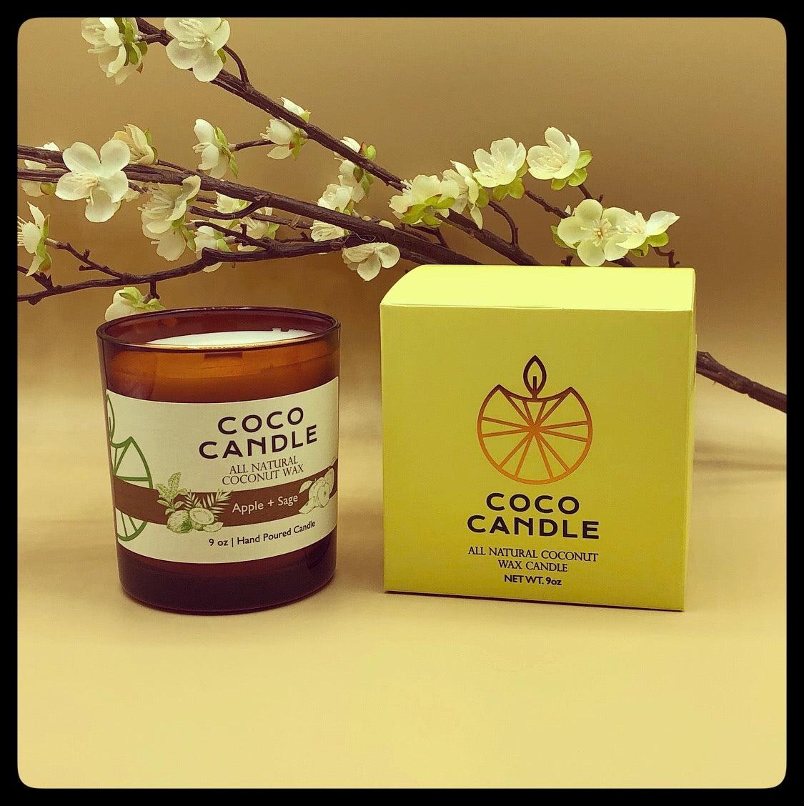 Coco Candle | An all-natural coconut wax candle hand poured into a sophisticated amber glass vessel enhanced by the soothing crackle of a wooden wick.  A refreshing blend of sweet, juicy apple and herbaceous sage.  